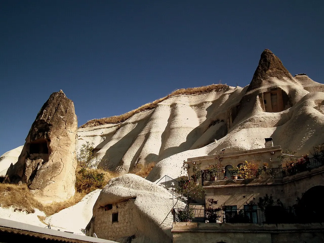Cave hotel rooms carved into fairy chimney rock formations at Local Cave House Hotel in Göreme