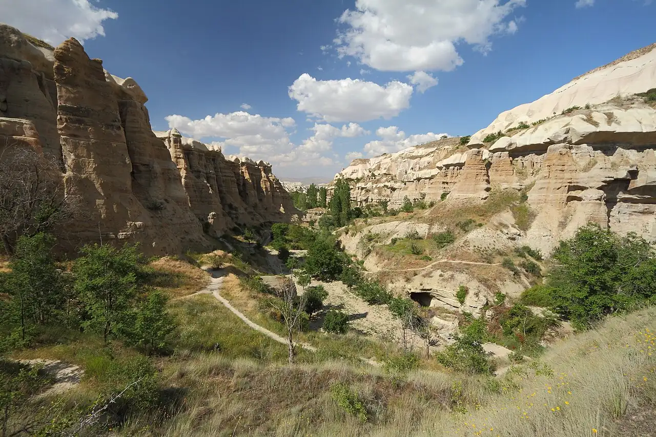 A walking trail winds through Pigeon Valley between Uçhisar and Göreme.