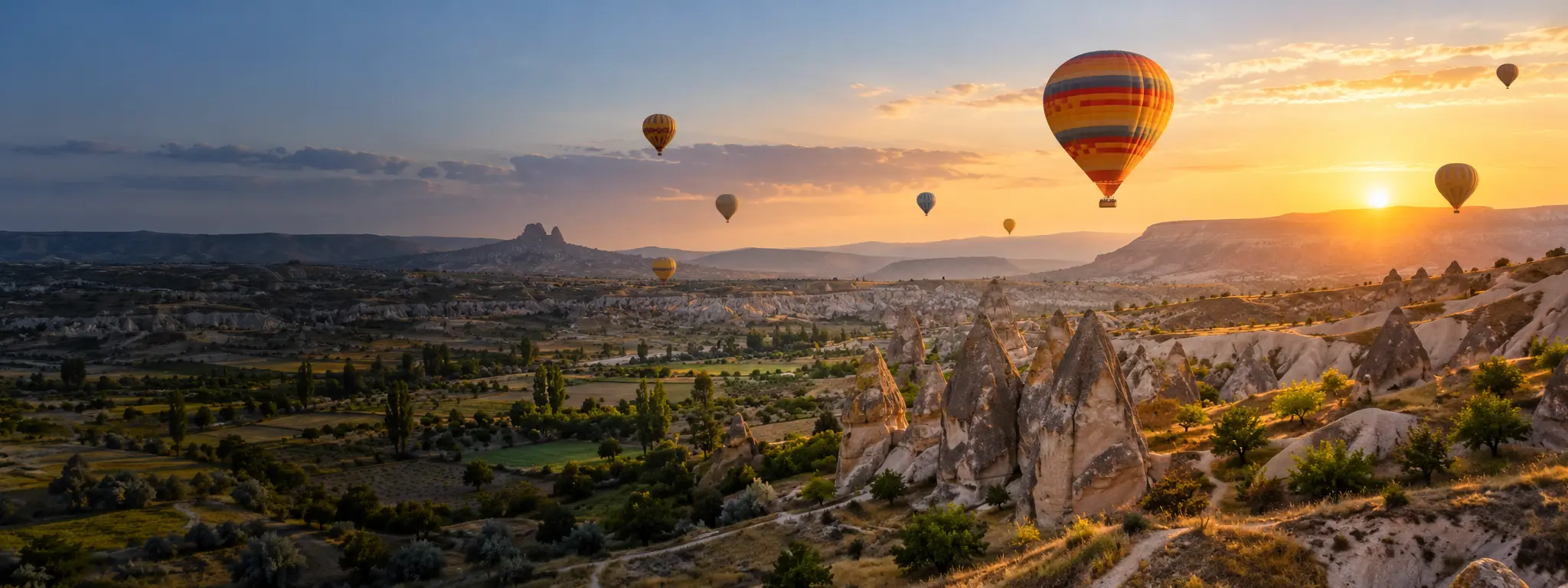 Hot-air balloons above the Cappadocia landscape